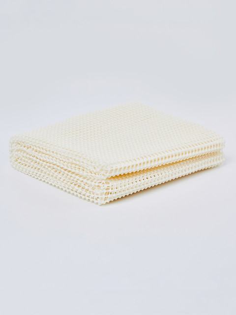 

Home Centre Beige Solid Melange Protective Carpet Lining