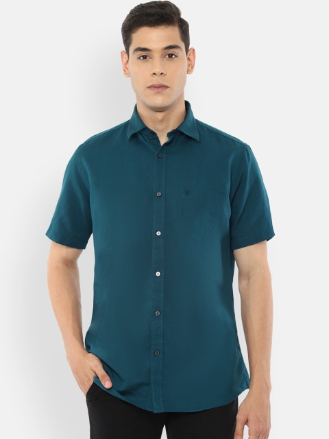 

Van Heusen Sport Men Blue Slim Fit Solid Casual Shirt