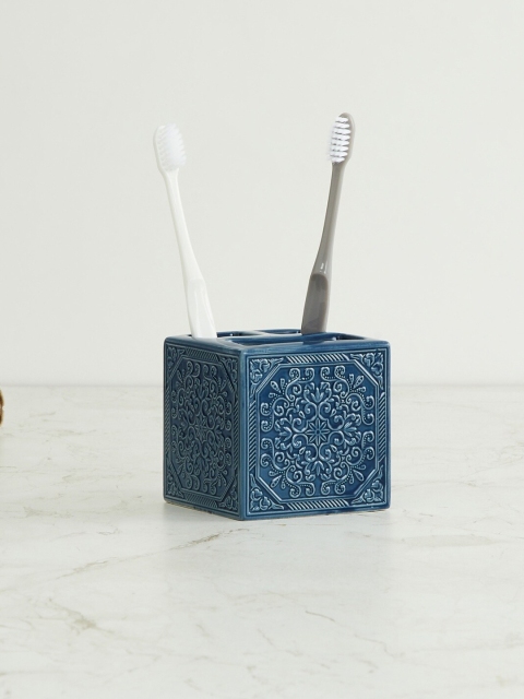 

Home Centre Blue Textured Magical Reflection Ceramic Tooth Brush Holder