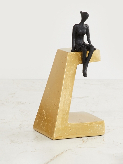 

Home Centre Gold-Toned & Black Eternity Figurine Bookend Showpiece