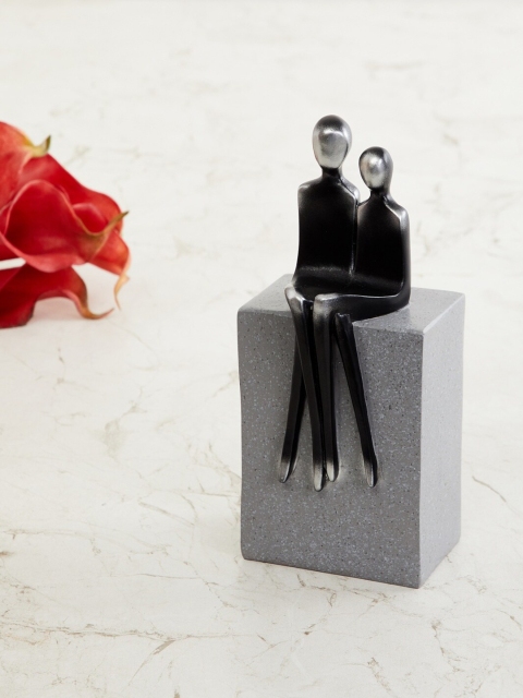 

Home Centre Grey & Black Splendid Pair Figurine On Block Showpiece
