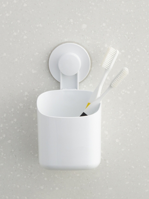 

Home Centre White Solid Orion Tooth Brush Holder With Suction Cup