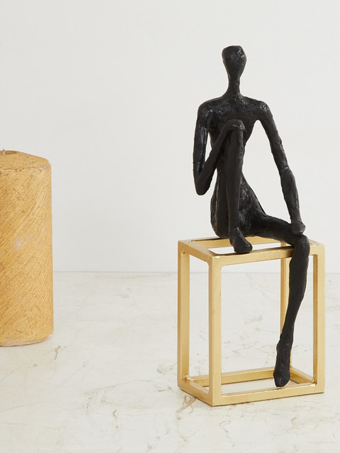 

Home Centre Black Eternity Polyresin Figurine on Metal Base