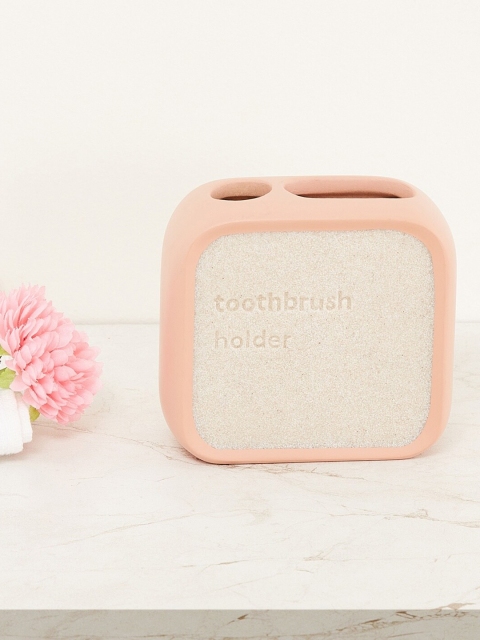 

Home Centre Peach Coloured & White Mystic Fables Polyresin Tooth Brush Holder