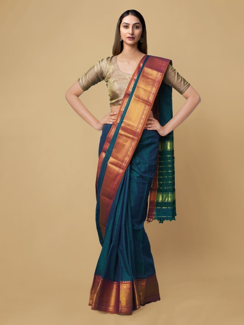 

Unnati Silks Teal Woven Design Zari Pure Cotton Narayan Peth Saree