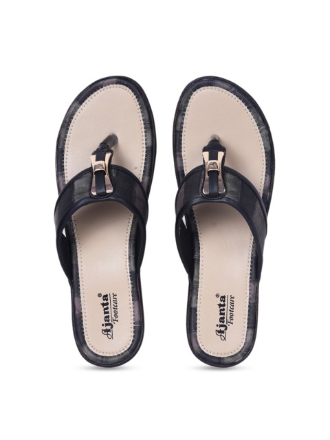 

Ajanta Women Beige & Black Textured Heels