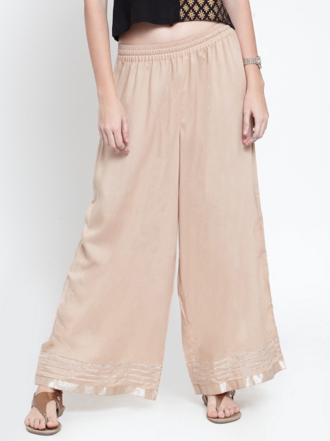 

KSUT Women Beige Hem Design Flared Palazzos