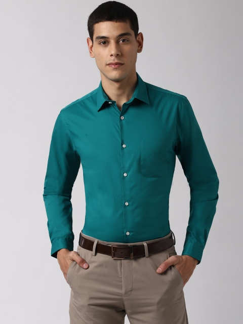 

Peter England Men Teal Green Slim Fit Solid Semi-Formal Shirt