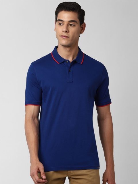

Peter England Casuals Men Blue Solid Polo Collar T-shirt