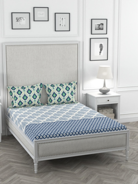 

Portico New York White & Blue Ethnic Motifs 144 TC Cotton 1 King Bedsheet with 2 Pillow Covers