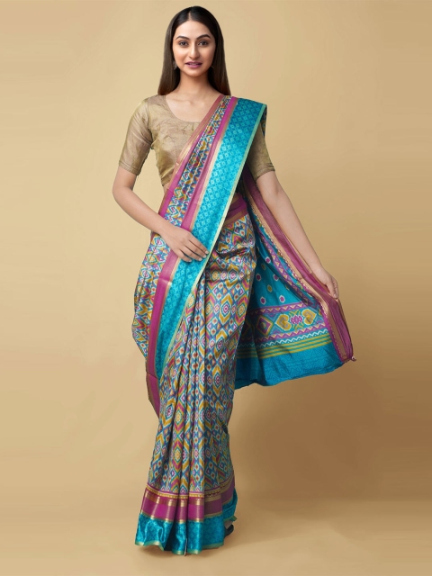 

Unnati Silks Blue & Pink Zari Art Silk Patola Handloom Saree