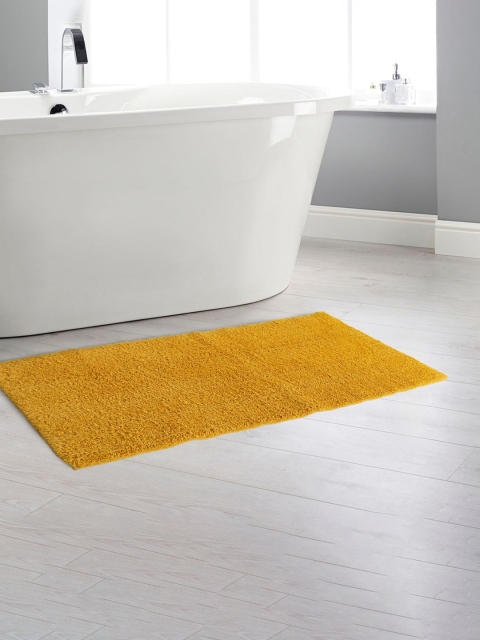

Home Centre Yellow Solid Bath Rug