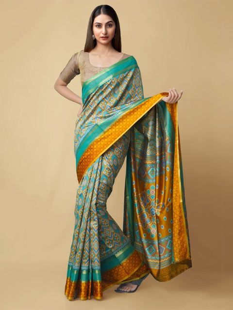 

Unnati Silks Sea Green & Orange Zari Art Silk Patola Handloom Saree