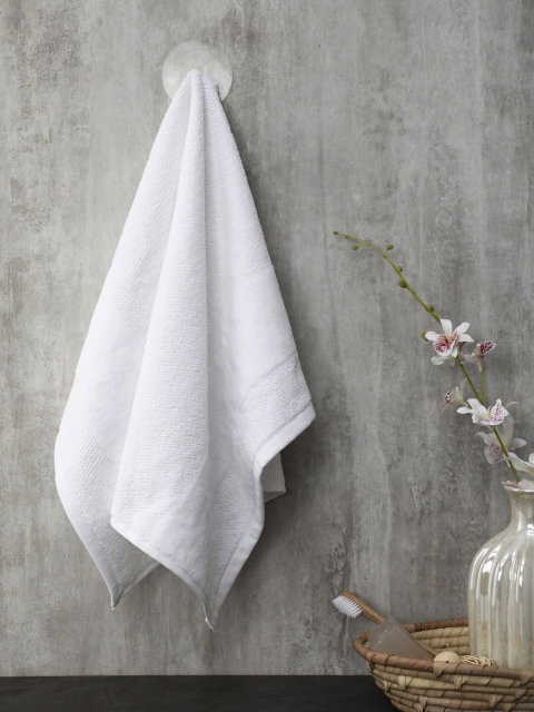 

Pure Home and Living Set Of 4 White Solid Cotton 550 GSM Hand Towels