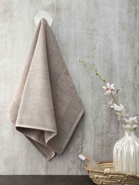 

Pure Home and Living Set Of 4 Beige Solid 550 GSM Cotton Hand Towels