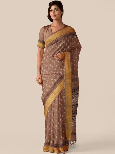 

Taneira Brown & White Ethnic Motifs Pure Linen Saree
