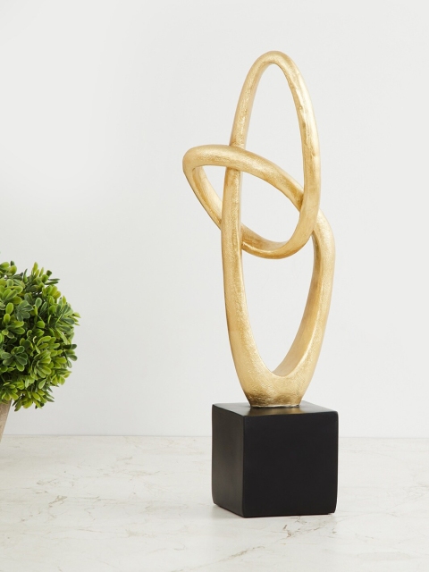 

Home Centre Gold-Toned & Black Ceramic Eternity Abstract Table Accent Showpiece