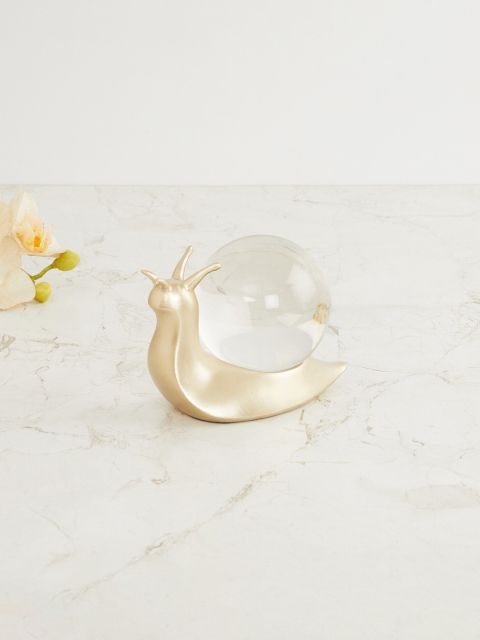 

Home Centre Gold-Toned & Transparent Splendid Snail With Crystal Ball Figurine Showpiece