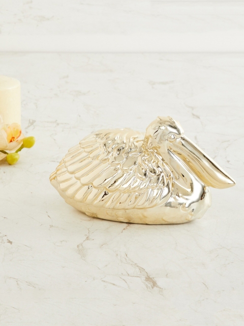 

Home Centre Gold-Toned Splendid Pelican Figurine Showpiece