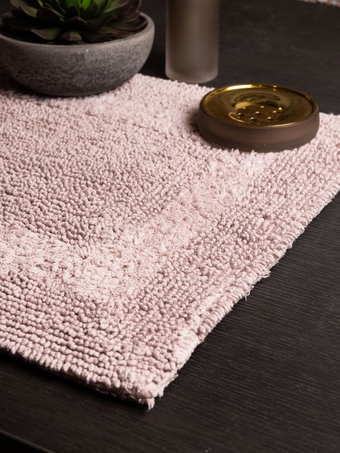 

Pure Home and Living Pink Reversible Solid Bath Rug