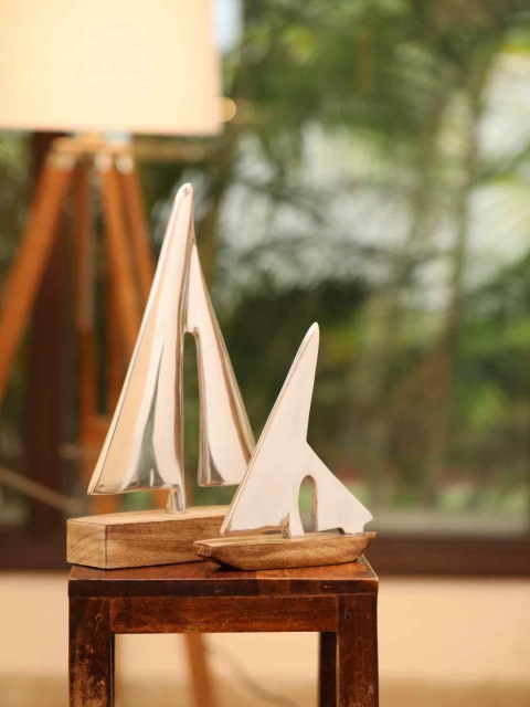 

Amoliconcepts Silver-Toned Sailing Boat Figurine Showpiece