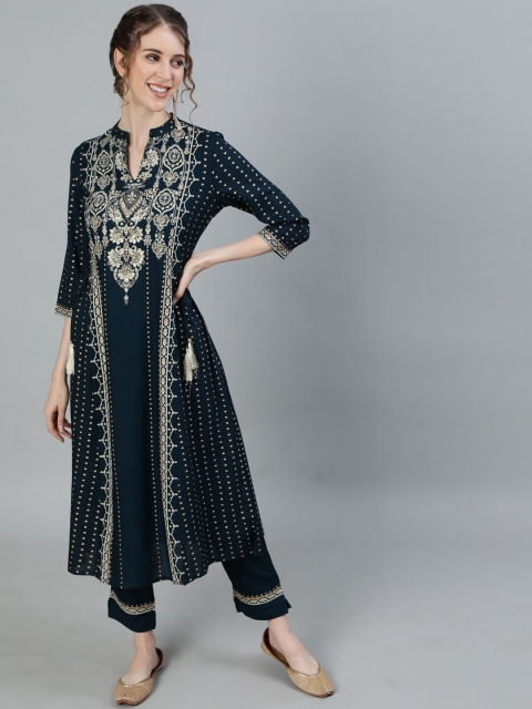 

Ishin Women Green Embroidered Panelled Kurti with Trousers