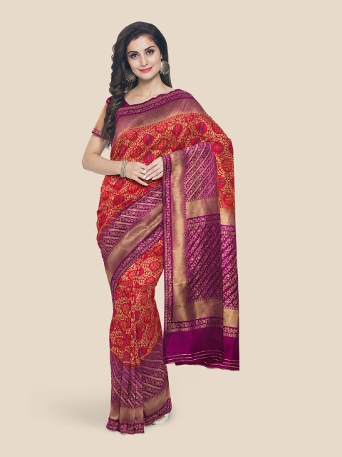 

Kalamandir Red & Purple Ethnic Motifs Zari Silk Blend Banarasi Saree