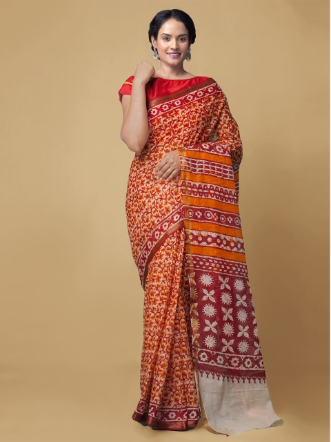 

Unnati Silks Cream & Orange Floral Pure Cotton Bagru Saree