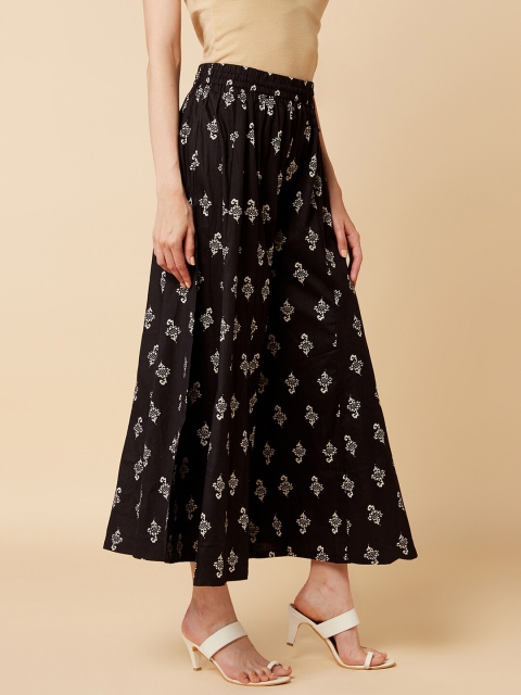 

KSUT Women Black & Cream-Coloured Ethnic Motifs Printed Flared Ethnic Palazzos