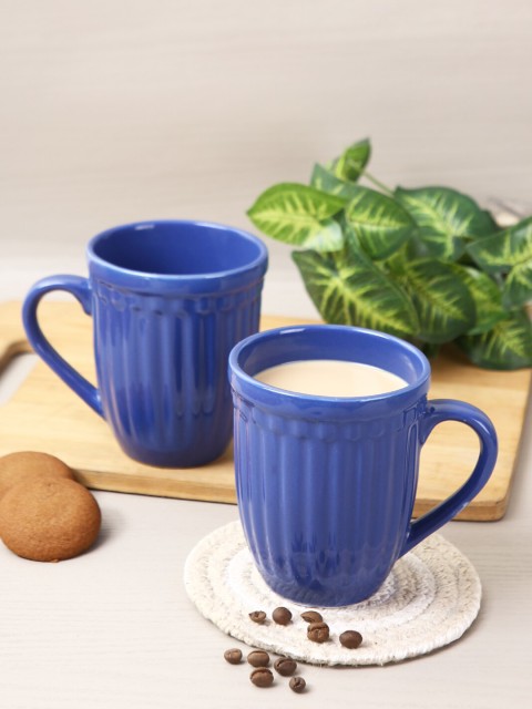 

Aapno Rajasthan Set Of 4 Blue Solid Ceramic Glossy Mugs