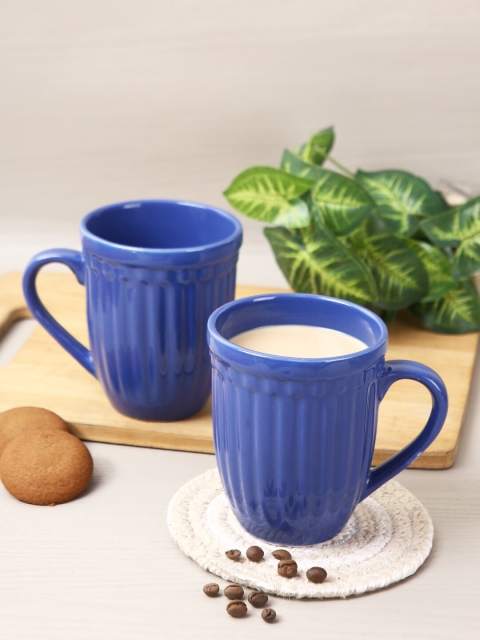 

Aapno Rajasthan Set Of 2 Blue Solid Ceramic Glossy Mugs