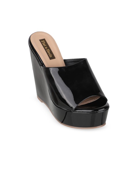 

Flat n Heels Black Wedge Pumps