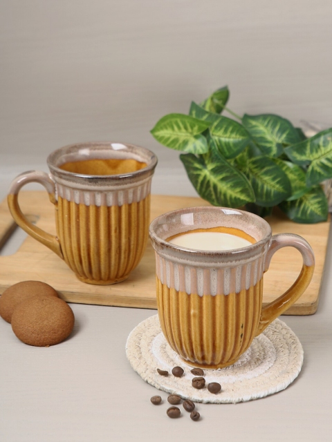 

Aapno Rajasthan Set Of 4 Brown Textured Ceramic Glossy Coffee Mugs