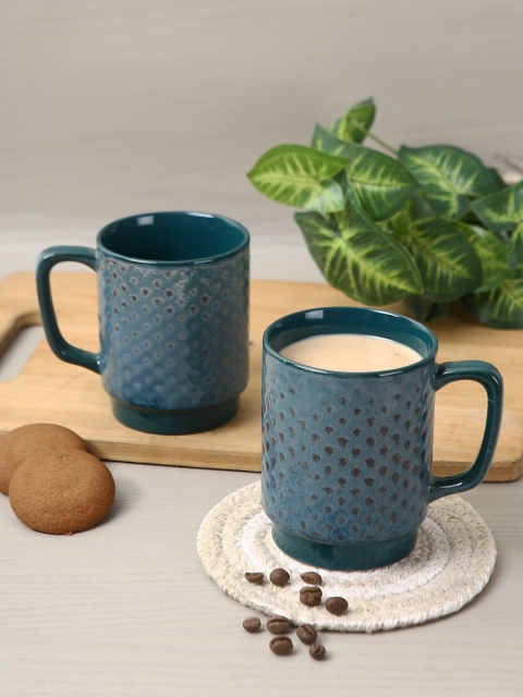 

Aapno Rajasthan Set Of 2 Teal Blue & Brown Textured Ceramic Glossy Mugs