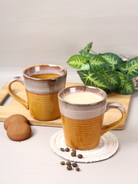 

Aapno Rajasthan Set Of 2 Brown Solid Ceramic Glossy Mugs