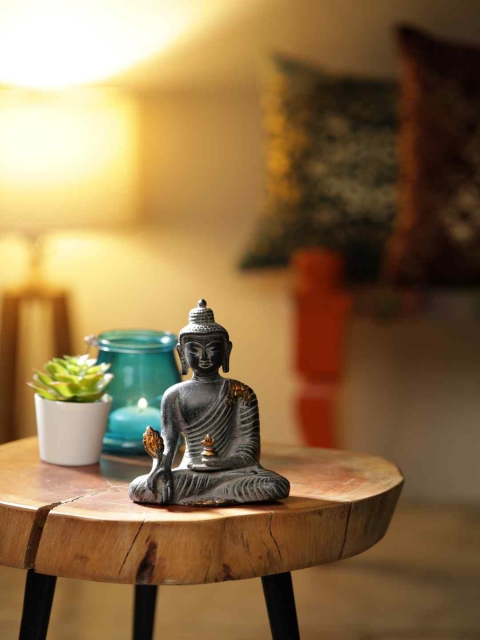 

Amoliconcepts Black Stone Finish Serene Budha Statue Showpiece
