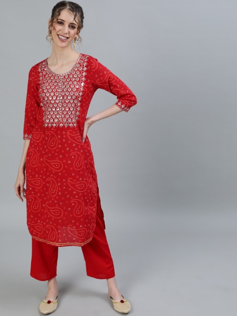 

Ishin Women Red Embroidered Ethnic Motifs Pure Cotton Kurta with Trousers