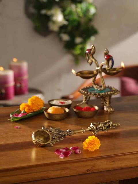 

Amoliconcepts Gold-Toned Krishna Idol Carved Havan Spoon