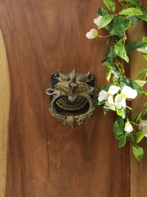 

Amoliconcepts Brown Antique Finsih Tibetan Art Door Knocker Showpiece