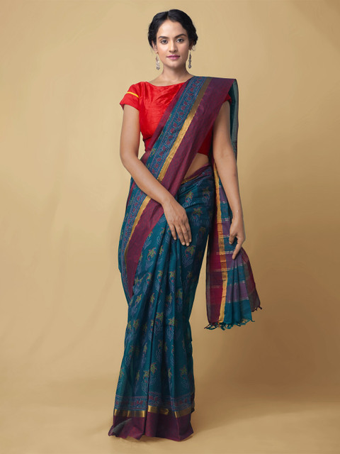 

Unnati Silks Blue & Purple Floral Pure Cotton Mangalagiri Saree