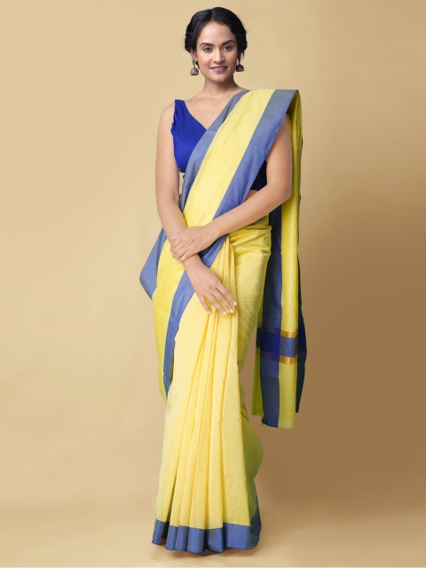 

Unnati Silks Yellow & Blue Colourblocked Silk Cotton Chettinad Saree