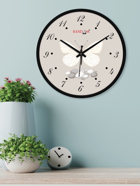 

RANDOM Black & White Printed 49 cm Analogue Contemporary Wall Clock