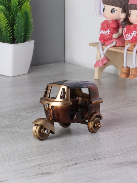 

Aapno Rajasthan Brown & Gold-Toned Brass Auto Rickshaw Showpiece