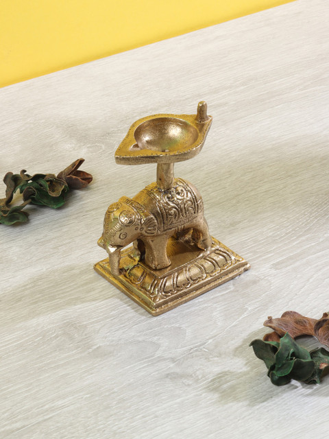 

Aapno Rajasthan Brown Elephant Figurine Brass Oil Lamp, Gold