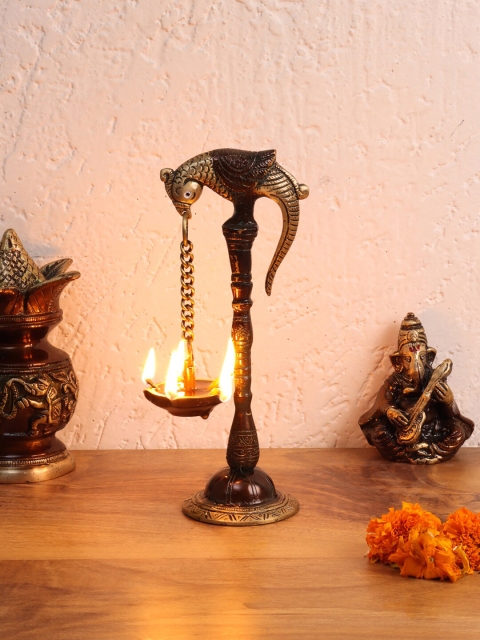

Aapno Rajasthan Brown Parrot Brass Oil Lamp