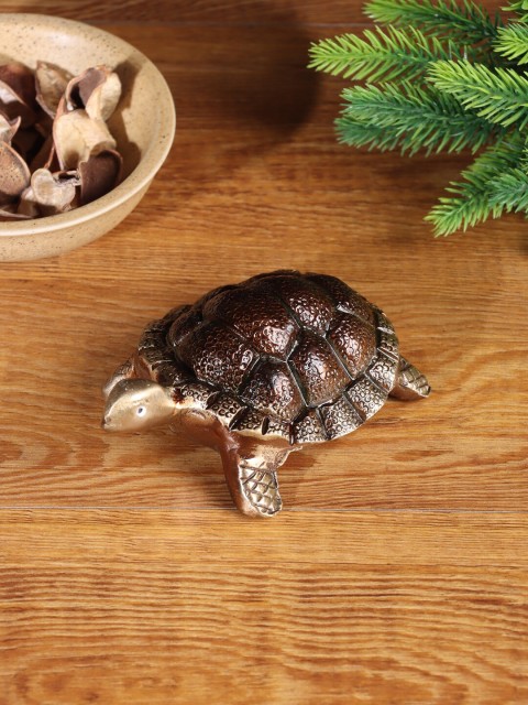 

Aapno Rajasthan Brown & Gold-Toned Small Turtle Brass Showpiece