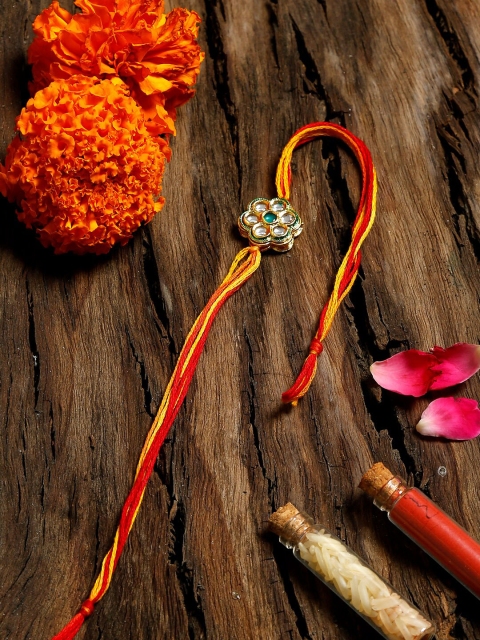 

Ruby Raang Red & Gold-Toned Handcrafted Kundan Rakhi Gift Box