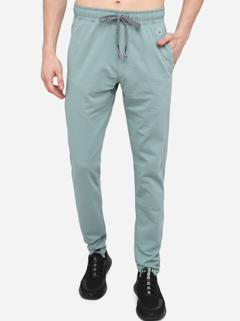 

JADE BLUE Men Blue Solid Slim-Fit Track Pants