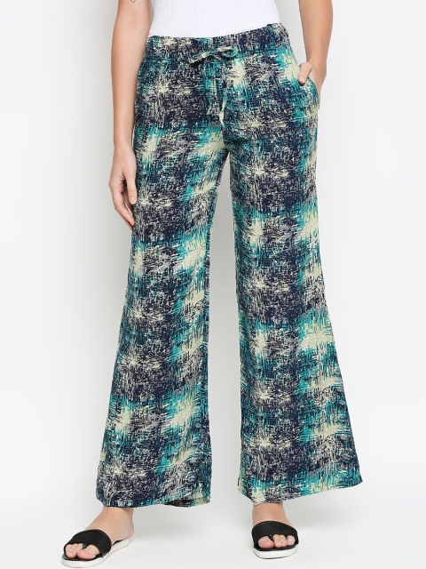 

XIN Women Green Printed Flared Palazzos
