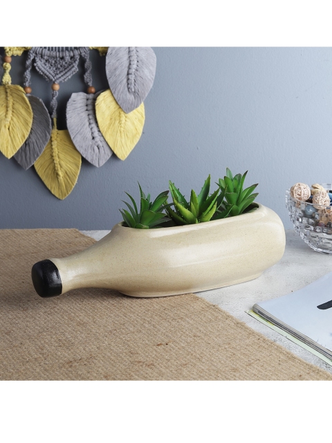 

The Decor Mart Cream-Coloured Solid Bottle-Shaped Ceramic Planter